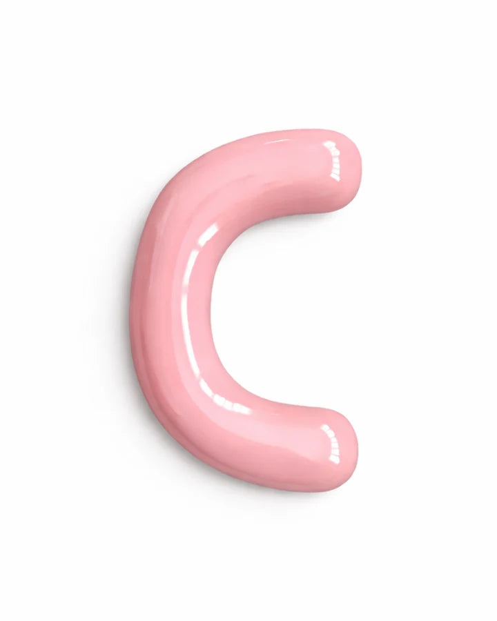 Pink U-shaped object on a white background