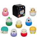 A collection of cute, colorful chick-shaped squishy toys in various colors, arranged around a black mystery light box. The image includes 'Series 1' and '9 to Collect' badges on a clean white background.