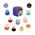 A collection of colorful, squishy ghost-shaped bath toys displayed around a purple mystery box on a white background. The image includes German text badges: 'SERIE 2' and '9 ZUM SAMMELN'.