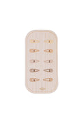 A set of ten clear plastic hair claw clips with gold-tone metal accents, arranged on a light beige and white vertically striped display card. The brand name 'elifaa' is printed in gold at the bottom of the card.