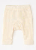 Cream ribbed knit baby leggings with a wide waistband and leg cuffs, shown flat on a white background.