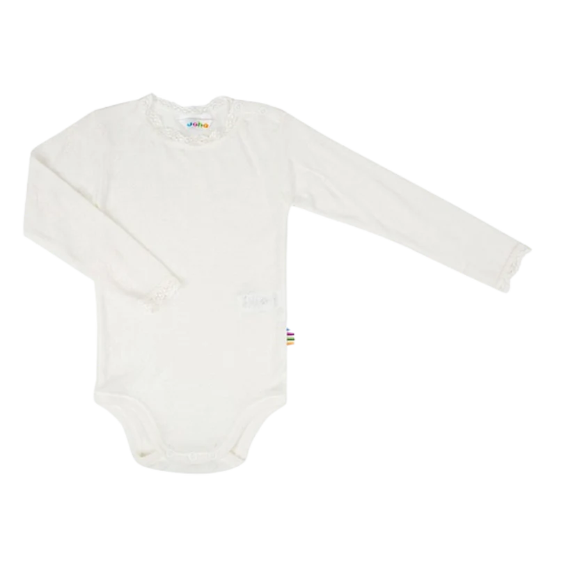 A long-sleeve white baby bodysuit with a ruffled lace neckline, laid flat against a white background.