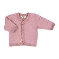 Pink baby cardigan on a white background