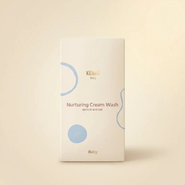 Kenko Baby Nurturing Cream Wash packaging on a beige background