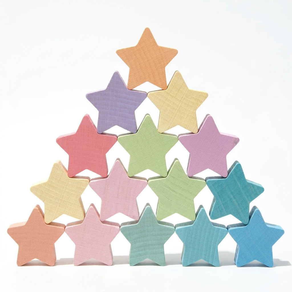 Pastel-colored star-shaped objects on a white background