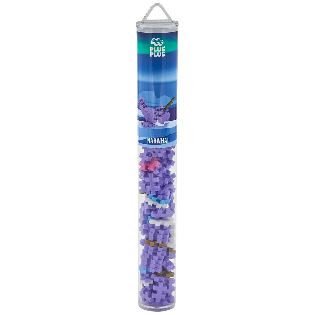 Tub of Plus Plus building blocks with a narwhal design on a white background