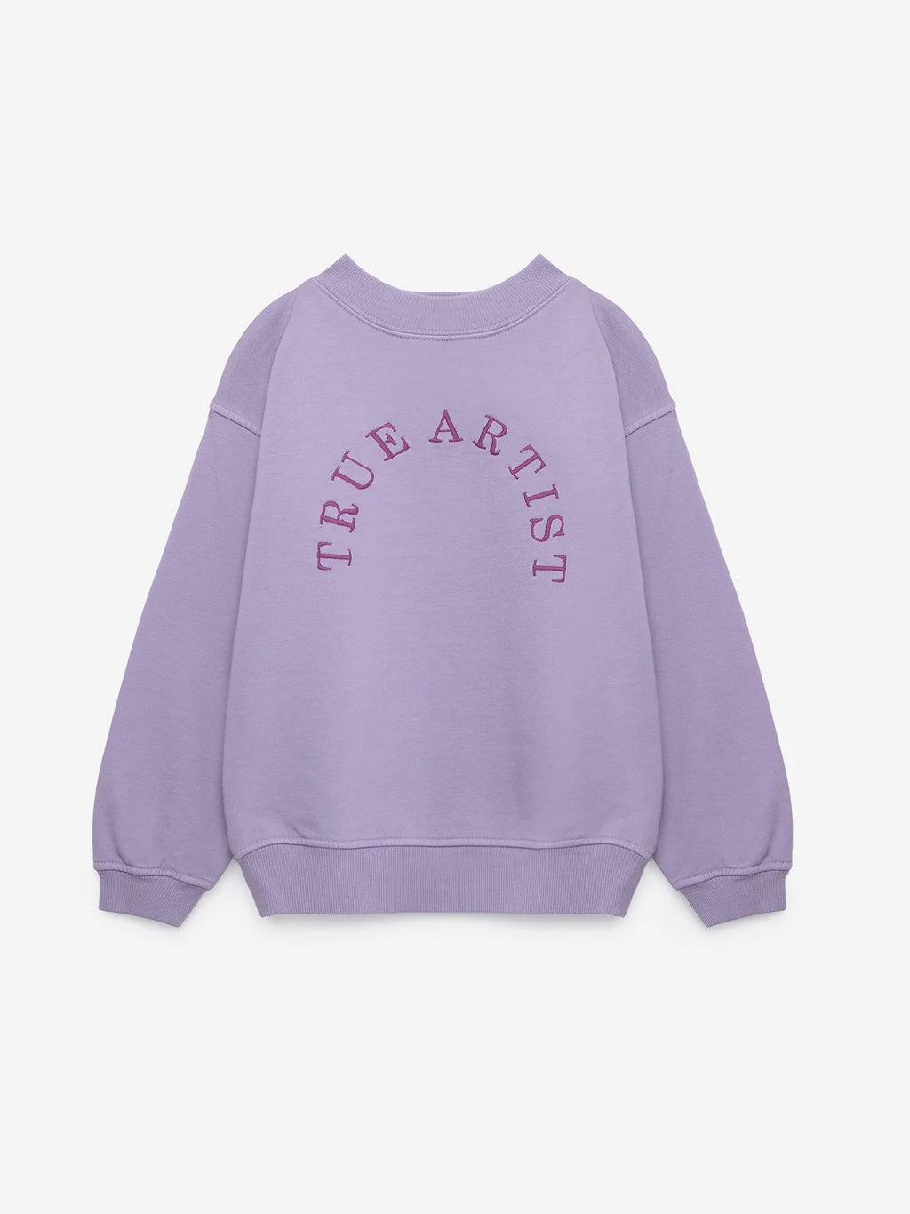 A light purple crewneck sweatshirt with 'TRUE ARTIST' printed in a matching purple arched font across the chest, displayed on a clean off-white background.