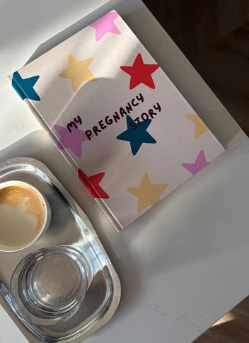 book with coffee on a table 