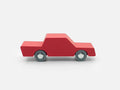 Red toy truck on a white background