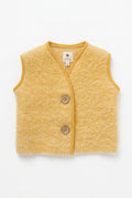 Yellow bodywarmer from Wollo family white background 