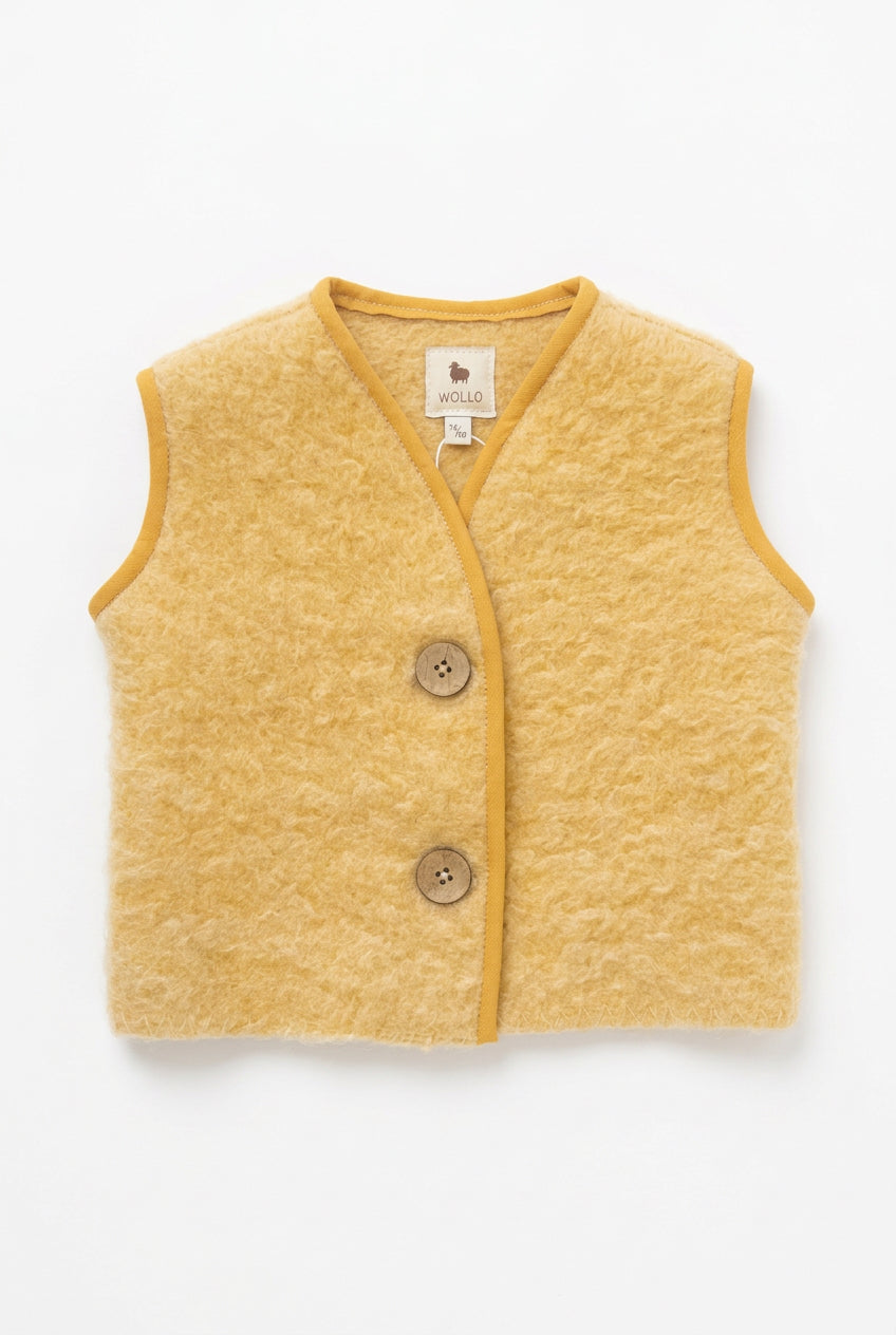 Yellow bodywarmer from Wollo family white background 