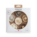 Packaging of FRIGG silicone teething bibs pacifier with visible branding on a white background