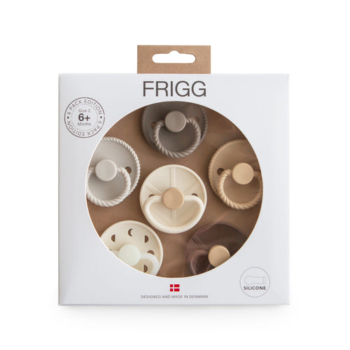 Packaging of FRIGG silicone teething bibs pacifier with visible branding on a white background