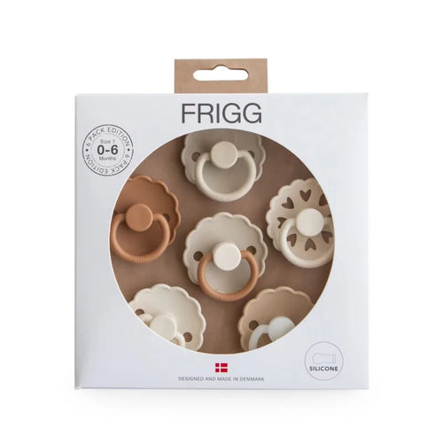 Packaged baby teether set with 'Frigg' branding on a white background