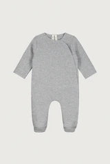 A light gray heather long-sleeve baby footed romper, photographed flat against a light gray background.