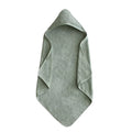 Green towel on a white background
