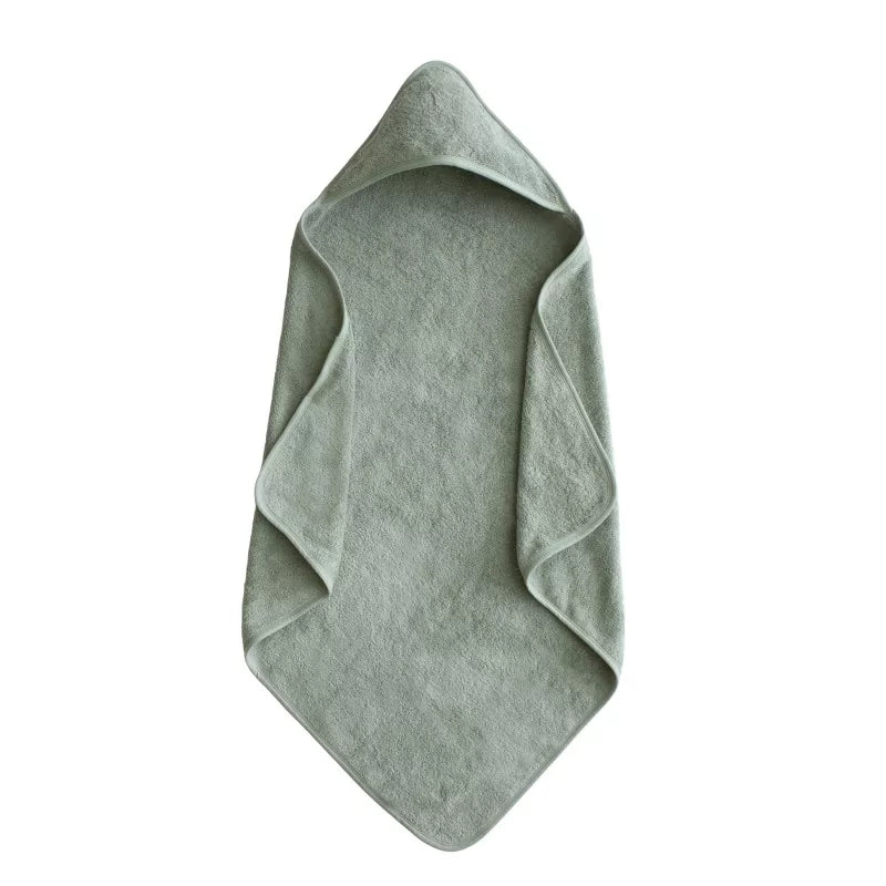 Green towel on a white background