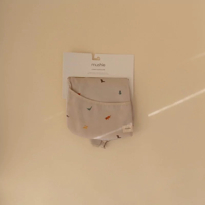 mushie-long-sleeve-bib-dino-print-folding